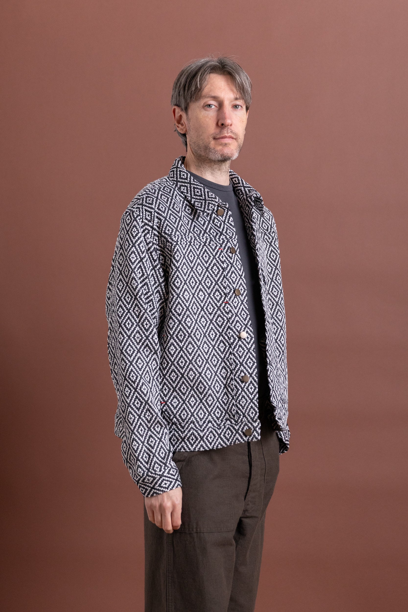 TRUCKER JACKET IN HANDWOVEN BLACK DIAMOND COTTON