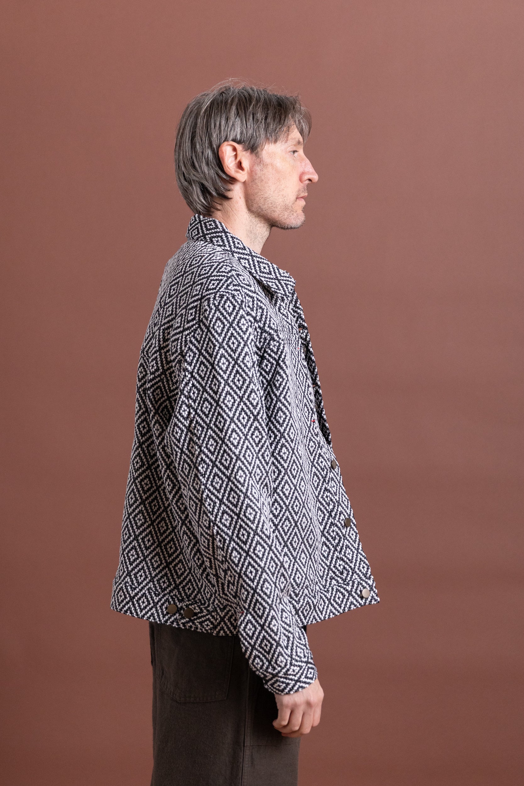 TRUCKER JACKET IN HANDWOVEN BLACK DIAMOND COTTON