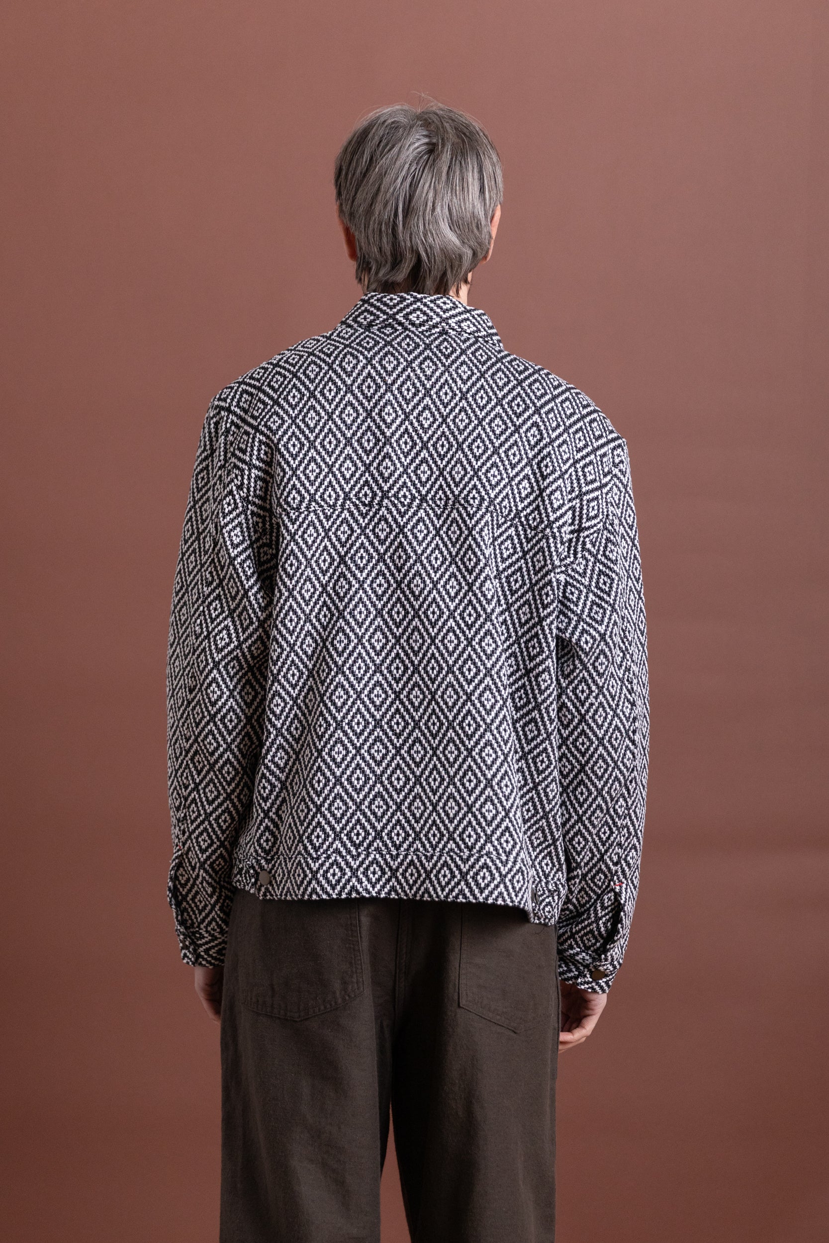 TRUCKER JACKET IN HANDWOVEN BLACK DIAMOND COTTON
