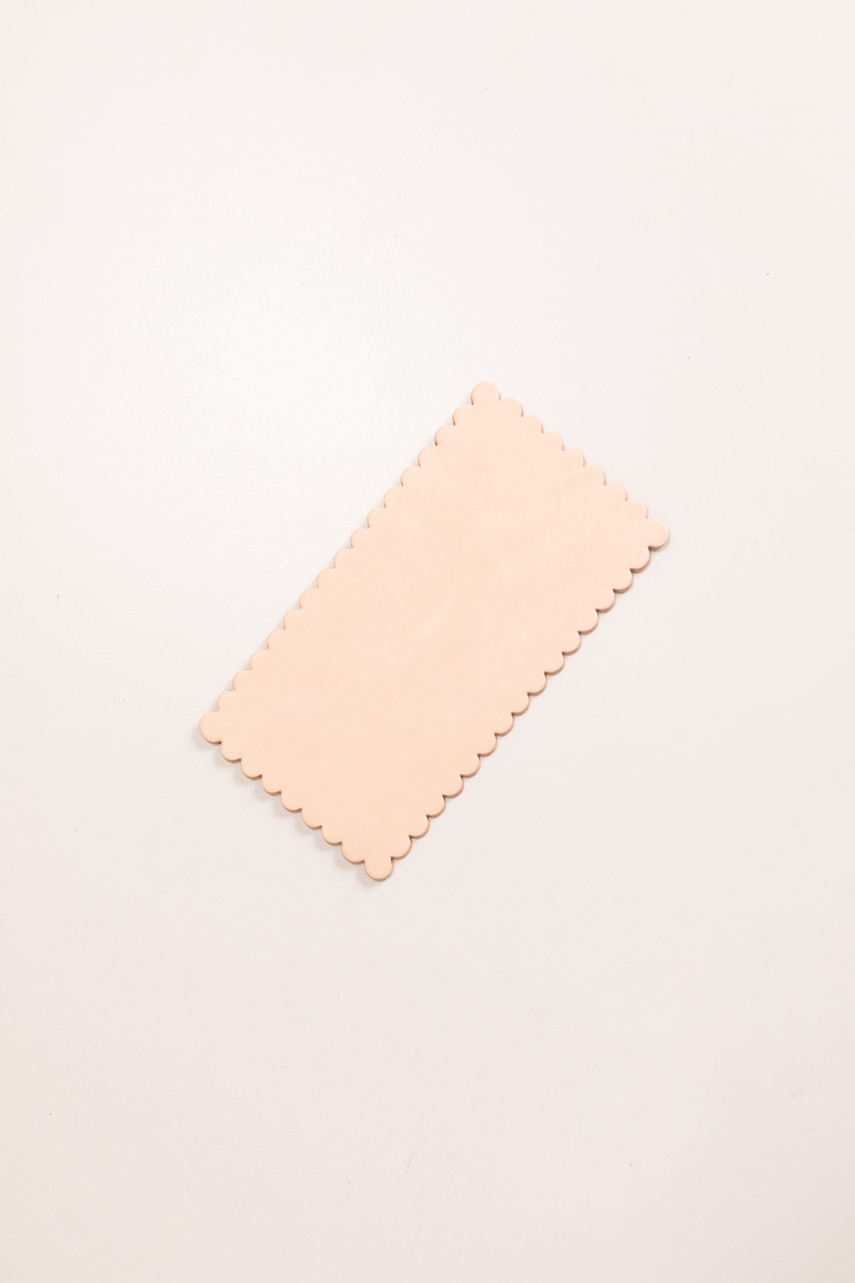 BIG BISCUIT COASTER IN VEG TAN LEATHER