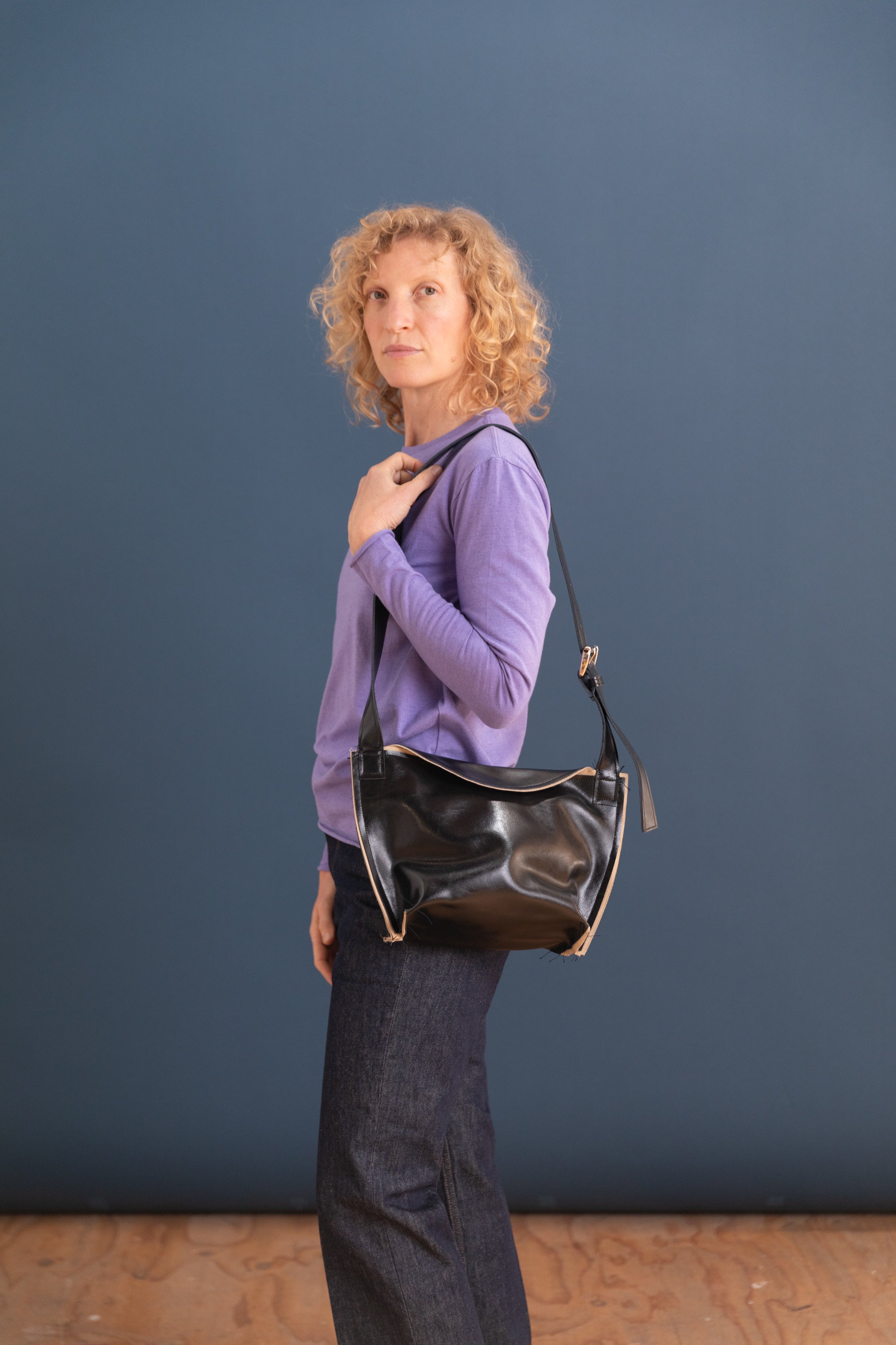 SMALL PUFF BAG IN BLACK LEATHER