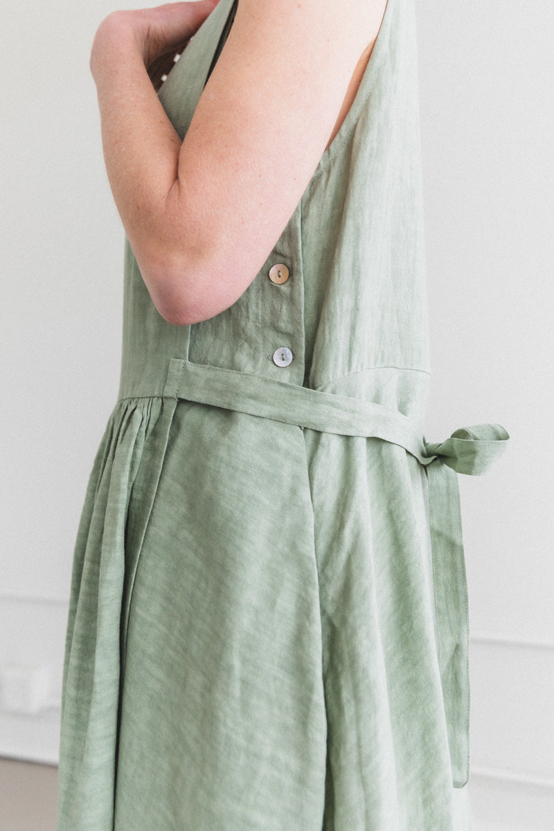 APRON DRESS IN SAGE LINEN