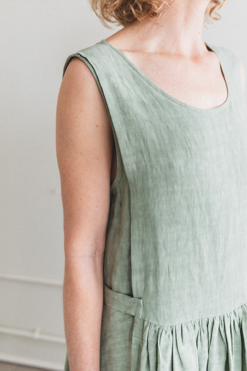 APRON DRESS IN SAGE LINEN