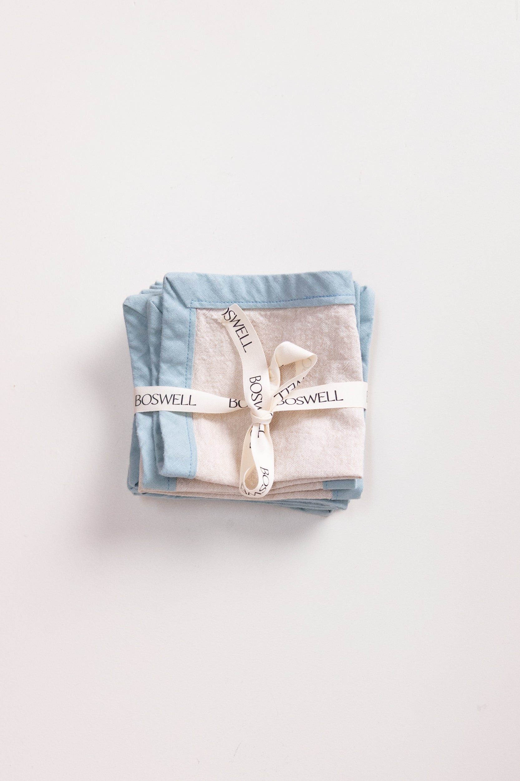 EDGED COCKTAIL NAPKINS IN CREAM LINEN - SET OF FOUR