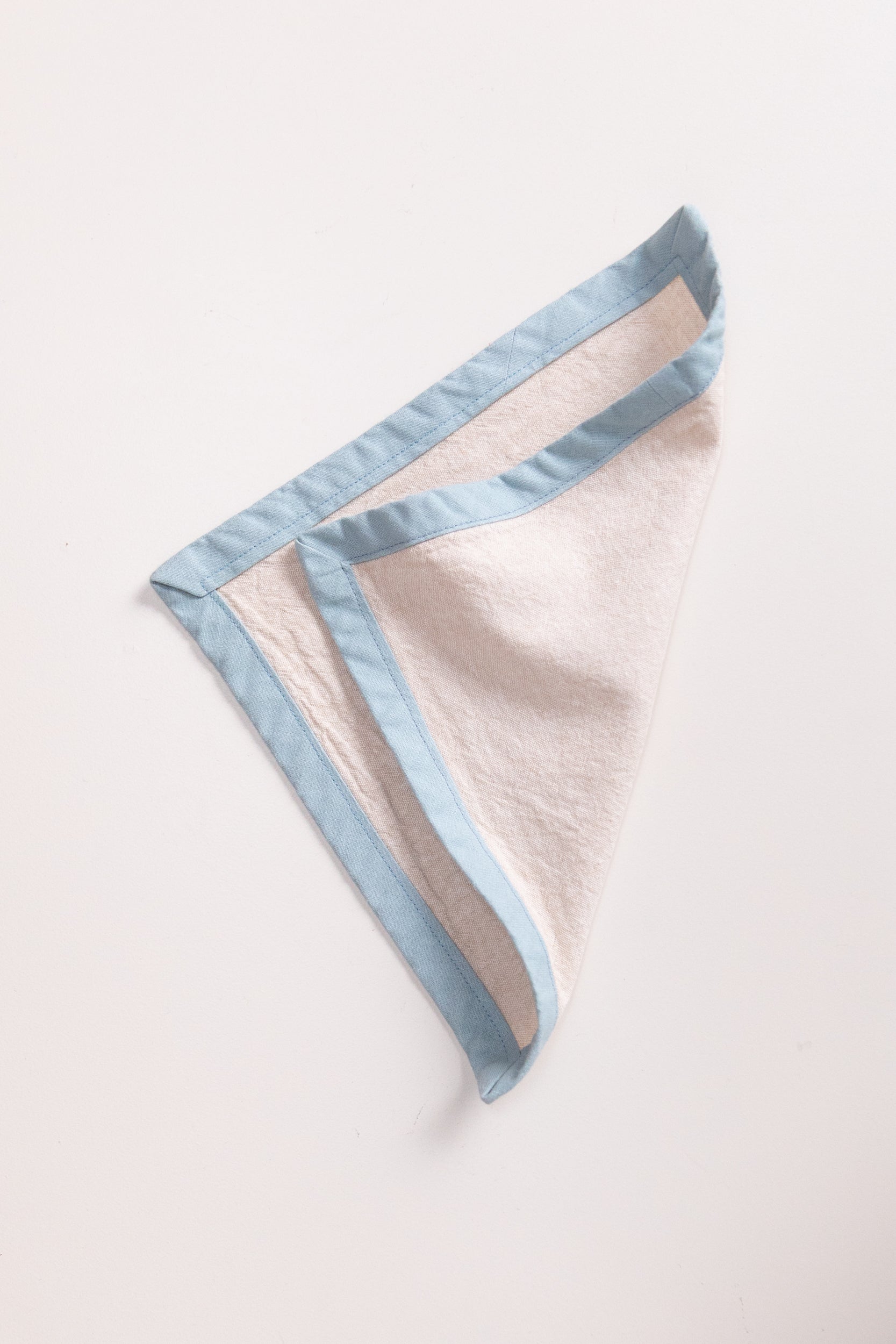 EDGED COCKTAIL NAPKINS IN CREAM LINEN - SET OF FOUR