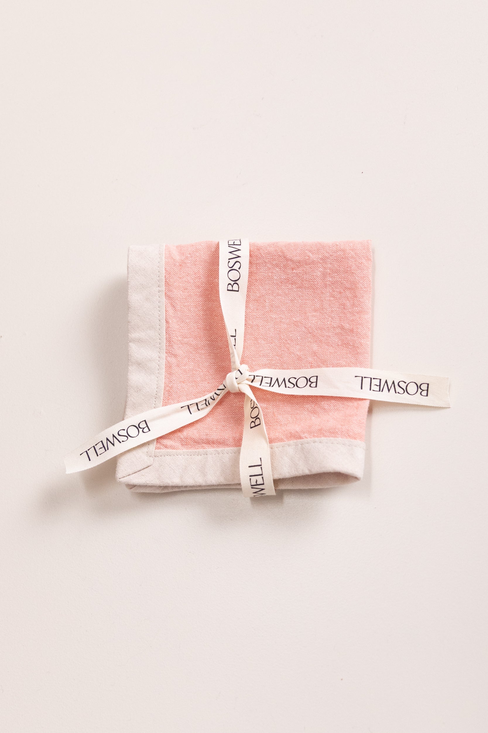 EDGED COCKTAIL NAPKINS IN CORAL LINEN - SET OF FOUR