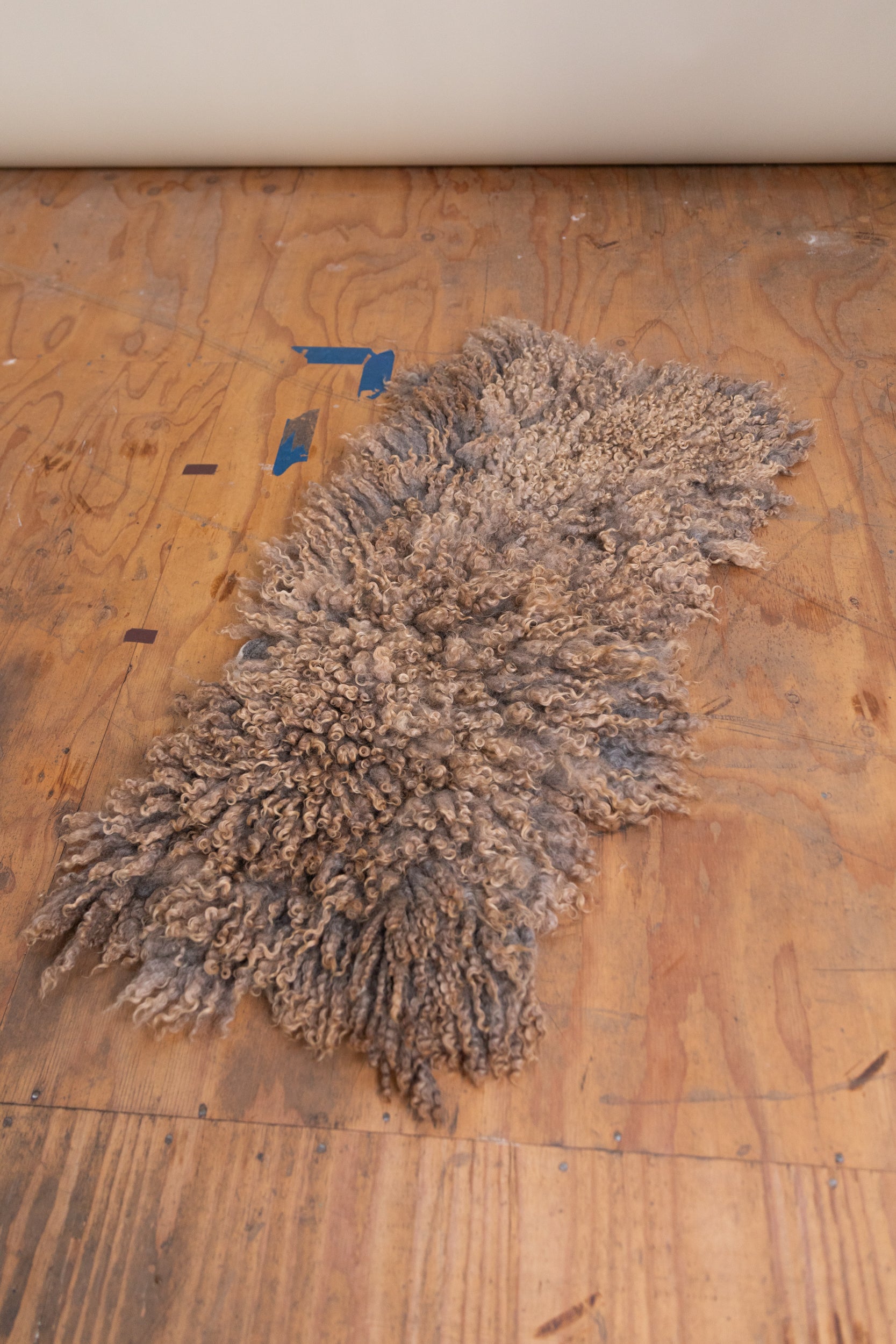 FELTED BENCH CUSHION IN NATURAL UNDYED WOOL