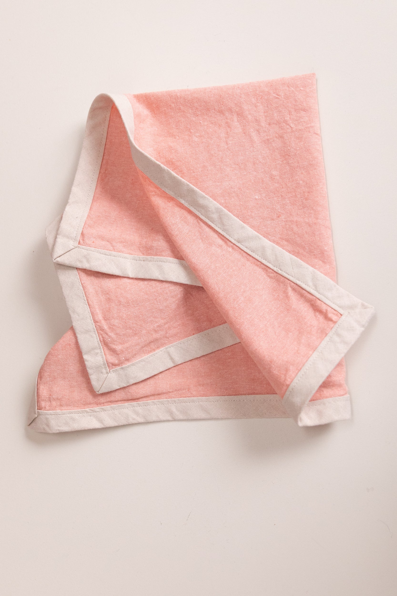 EDGED COCKTAIL NAPKINS IN CORAL LINEN - SET OF TWO