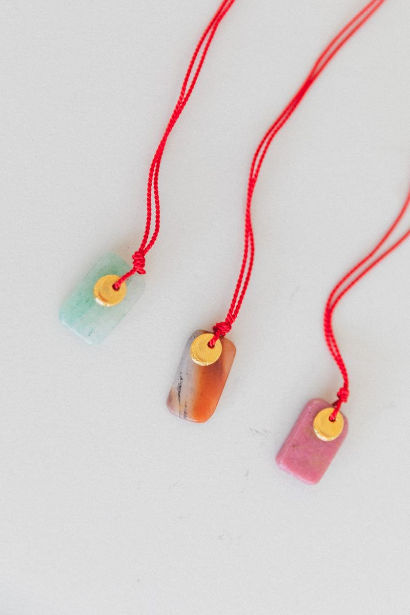 SOL NECKLACE ON A SILK CORD