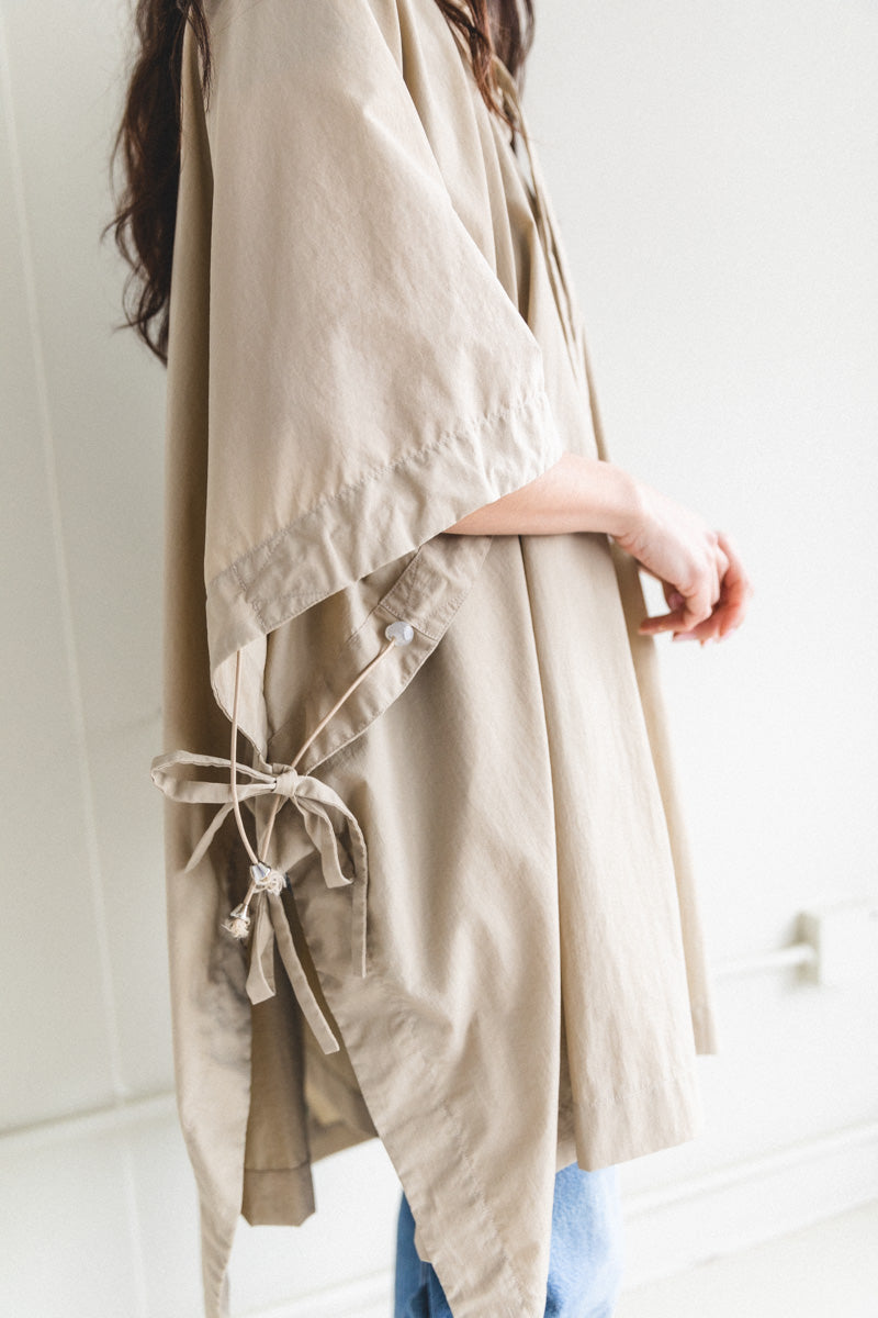 SHORT PONCHO IN BEIGE LIGHT TECH