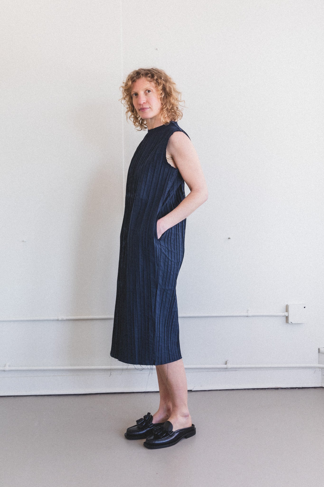 HAND PLEATED COCKTAIL DRESS IN NAVY