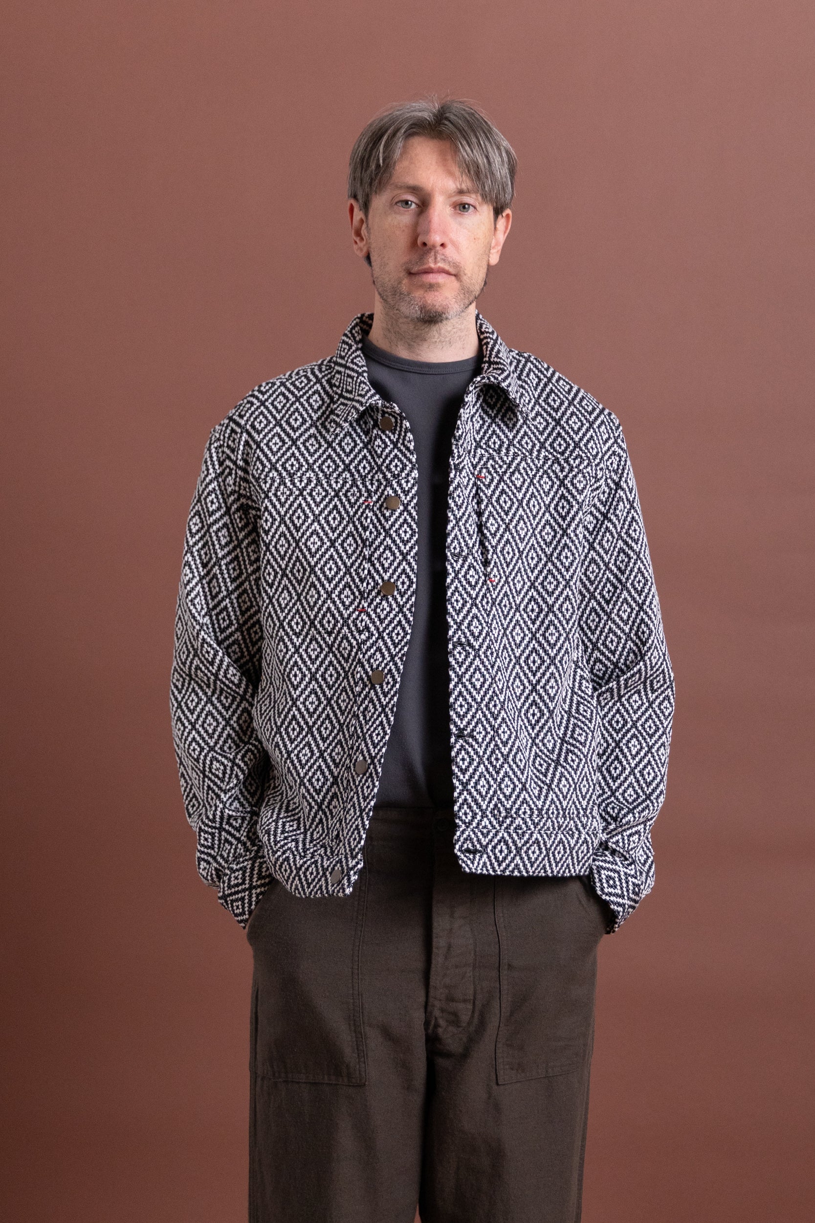 TRUCKER JACKET IN HANDWOVEN BLACK DIAMOND COTTON