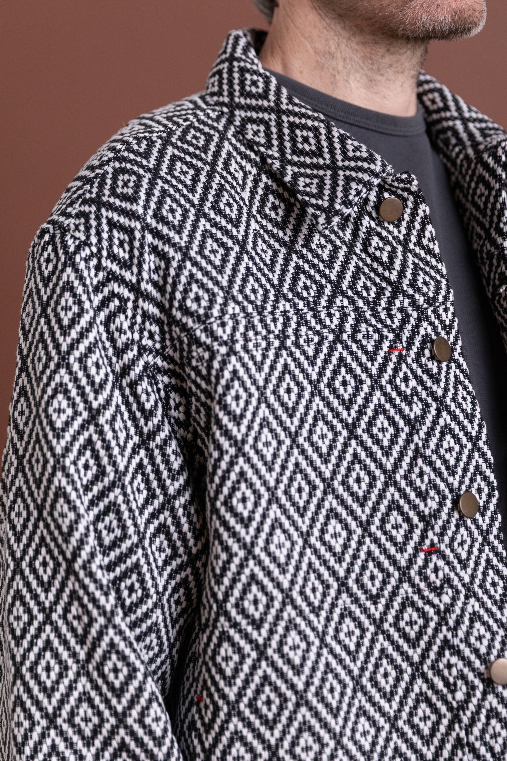 TRUCKER JACKET IN HANDWOVEN BLACK DIAMOND COTTON