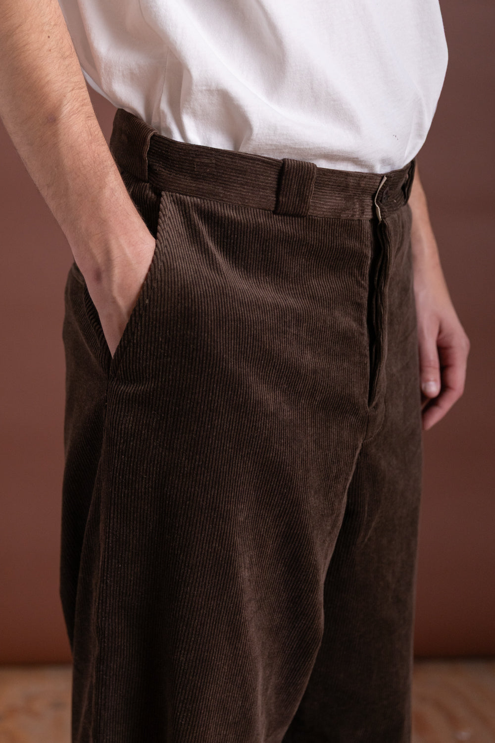 FLAT FRONT PANTS IN BROWN SUMI INK CORDUROY