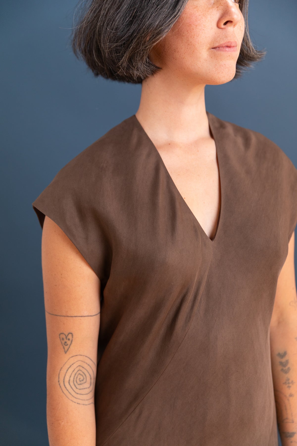 INFINITE DRESS IN MUD DYED BROWN