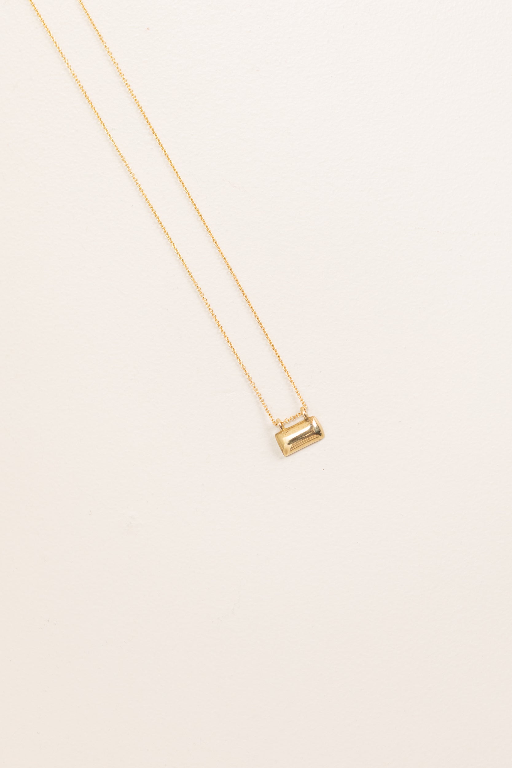 SMALL BRICK NECKLACE IN BRONZE