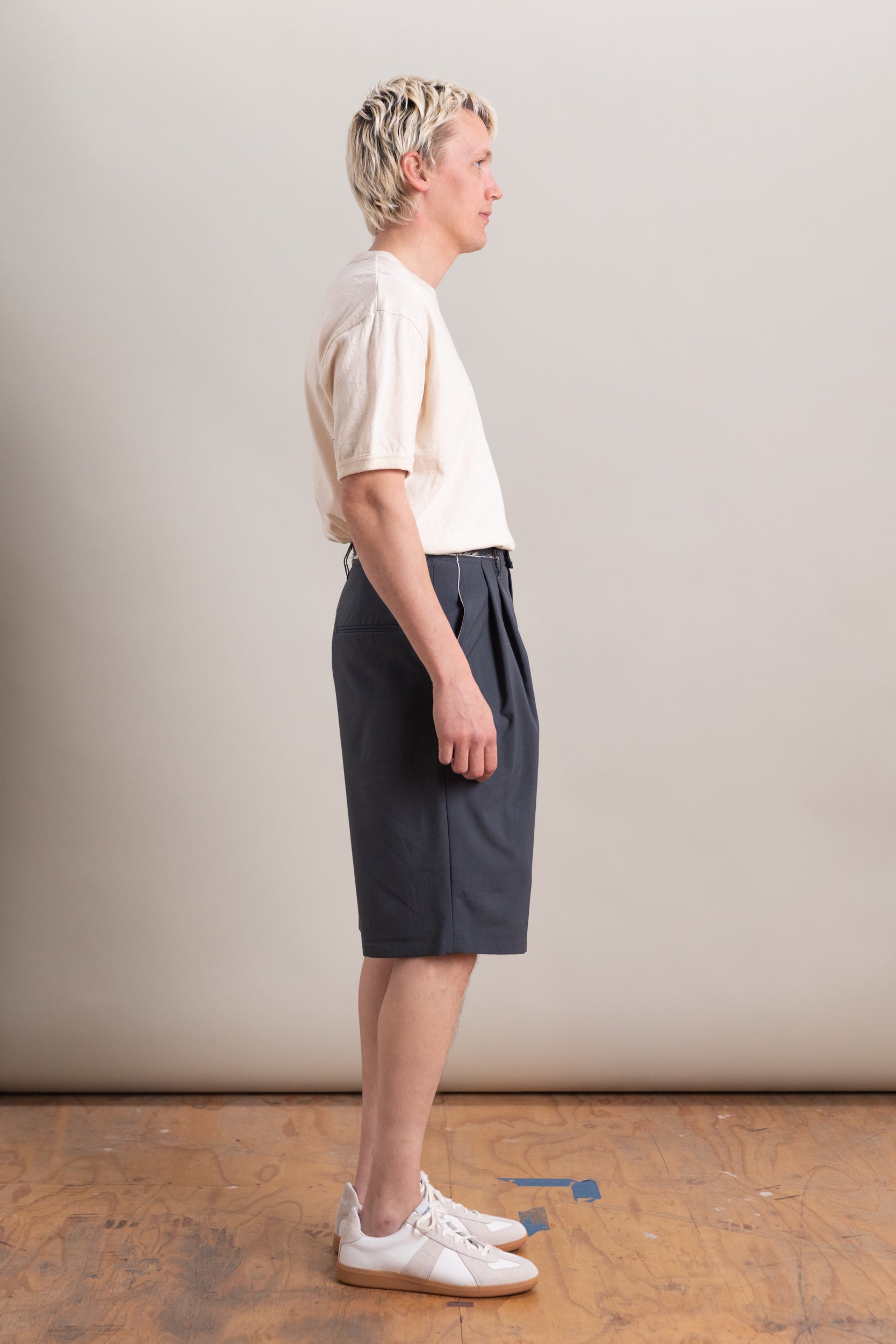 SLIM SUIT SHORTS IN PETROL