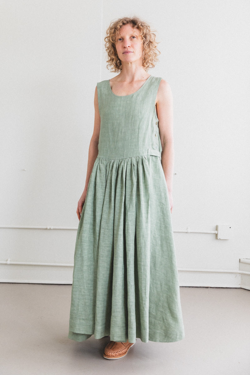 APRON DRESS IN SAGE LINEN