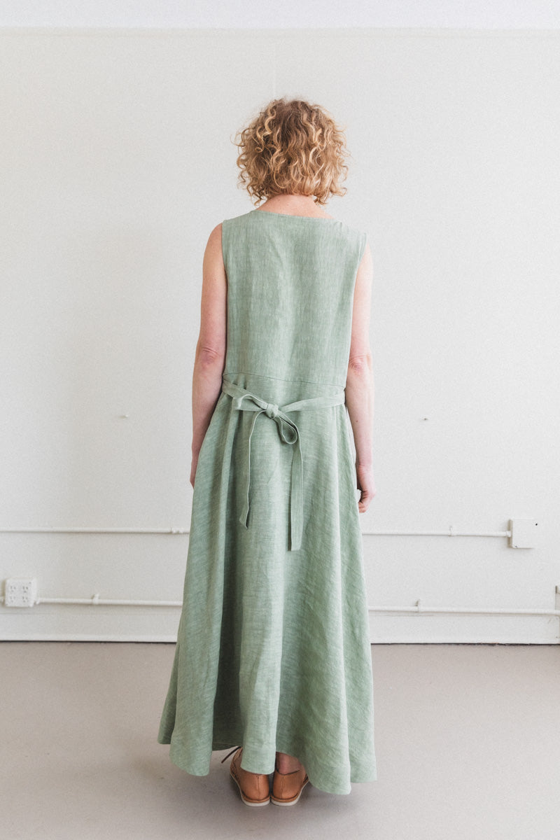 APRON DRESS IN SAGE LINEN