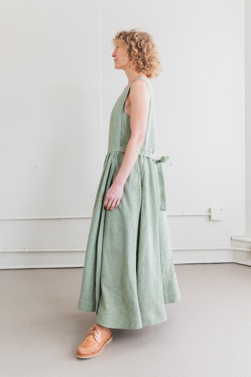 APRON DRESS IN SAGE LINEN