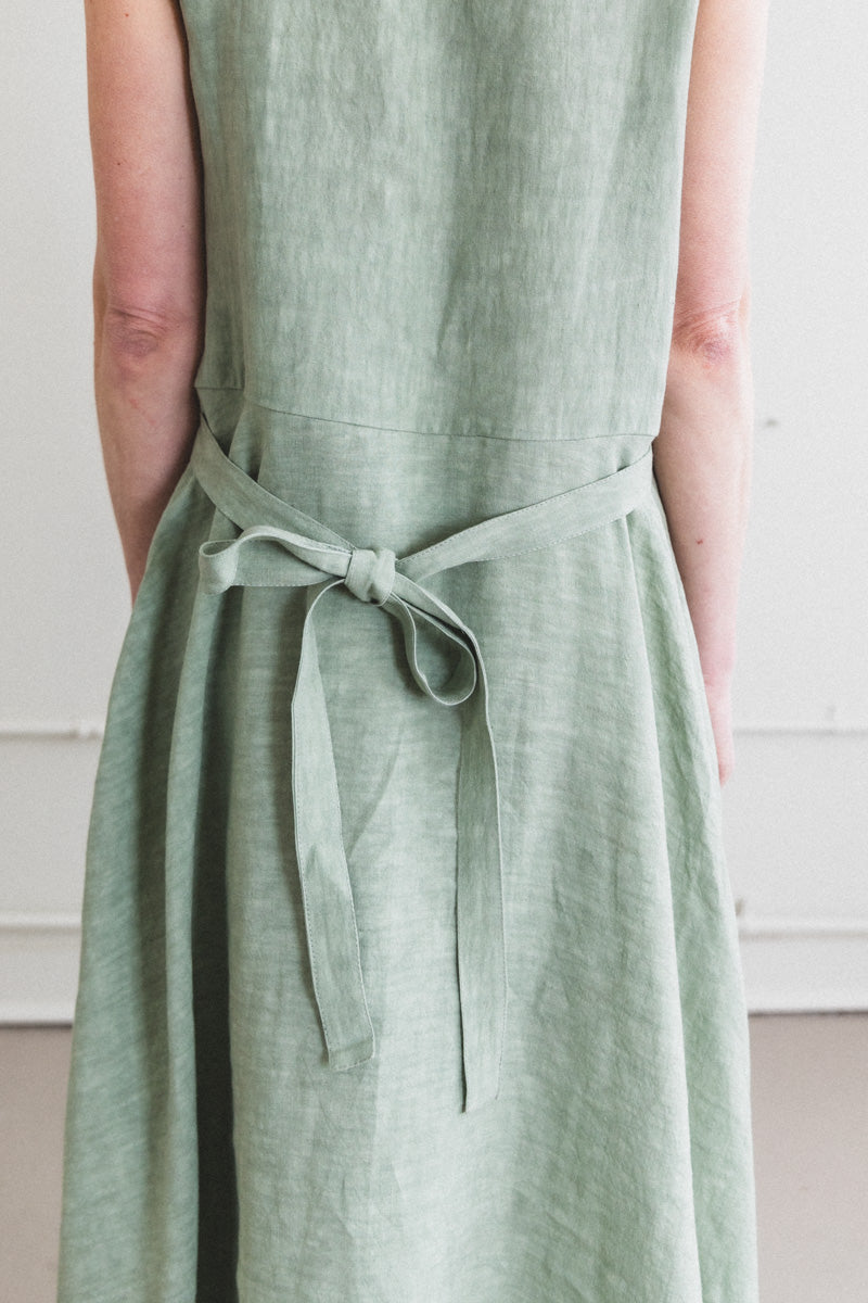 APRON DRESS IN SAGE LINEN