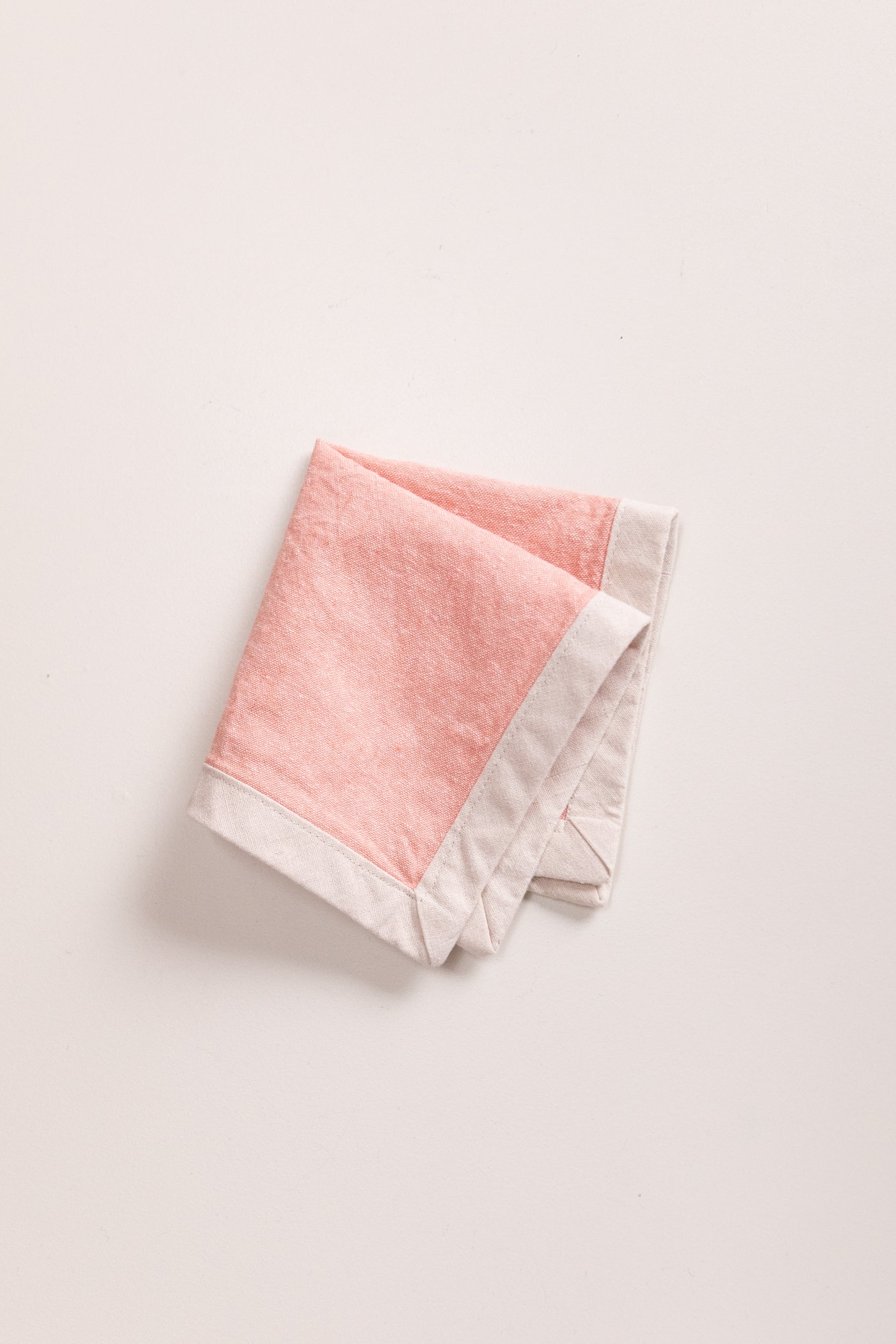 EDGED COCKTAIL NAPKINS IN CORAL LINEN - SET OF FOUR