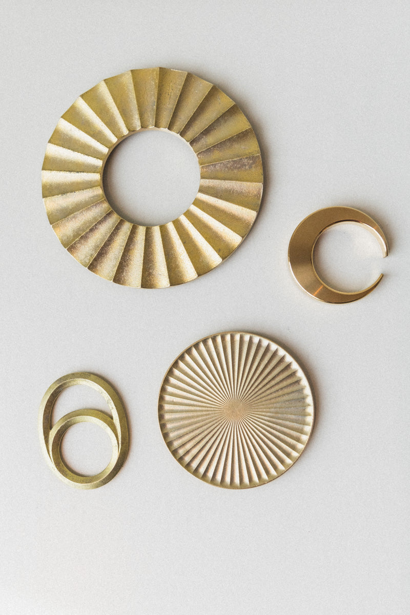 BRASS ECLIPSE BOTTLE OPENER