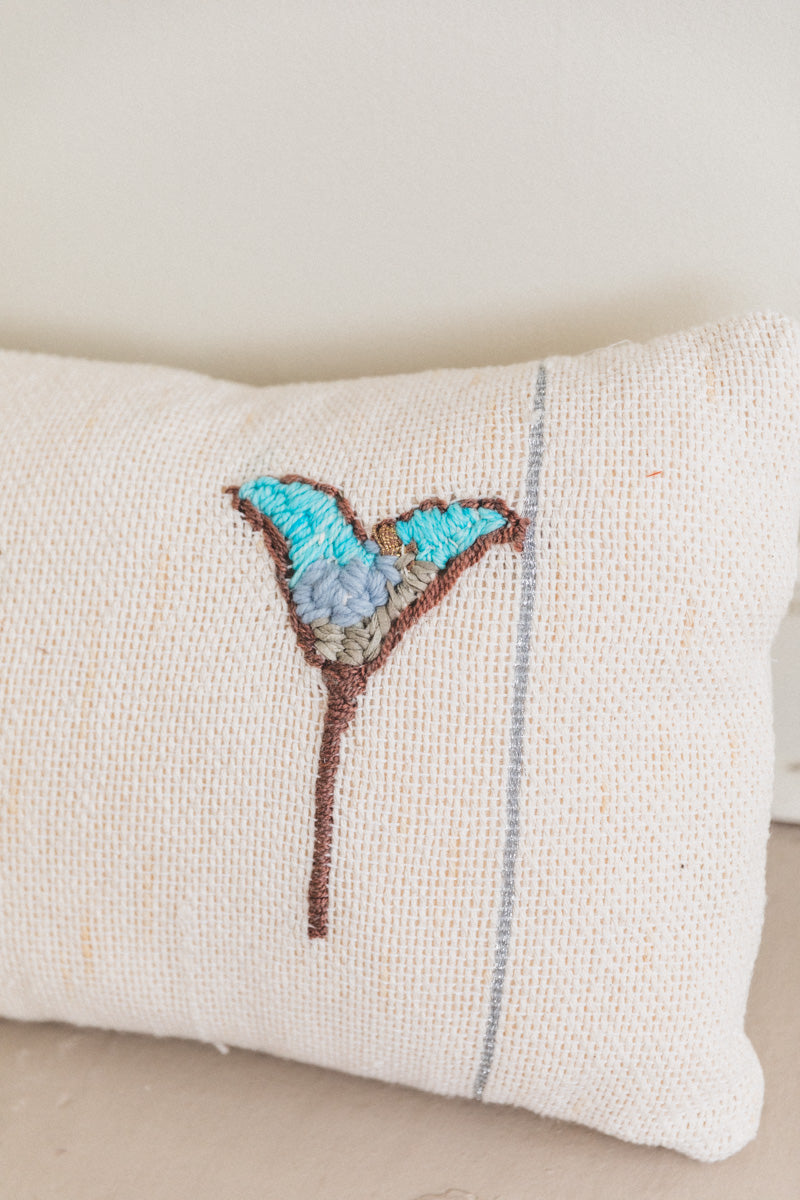 EMBROIDERED FLOWER PILLOW