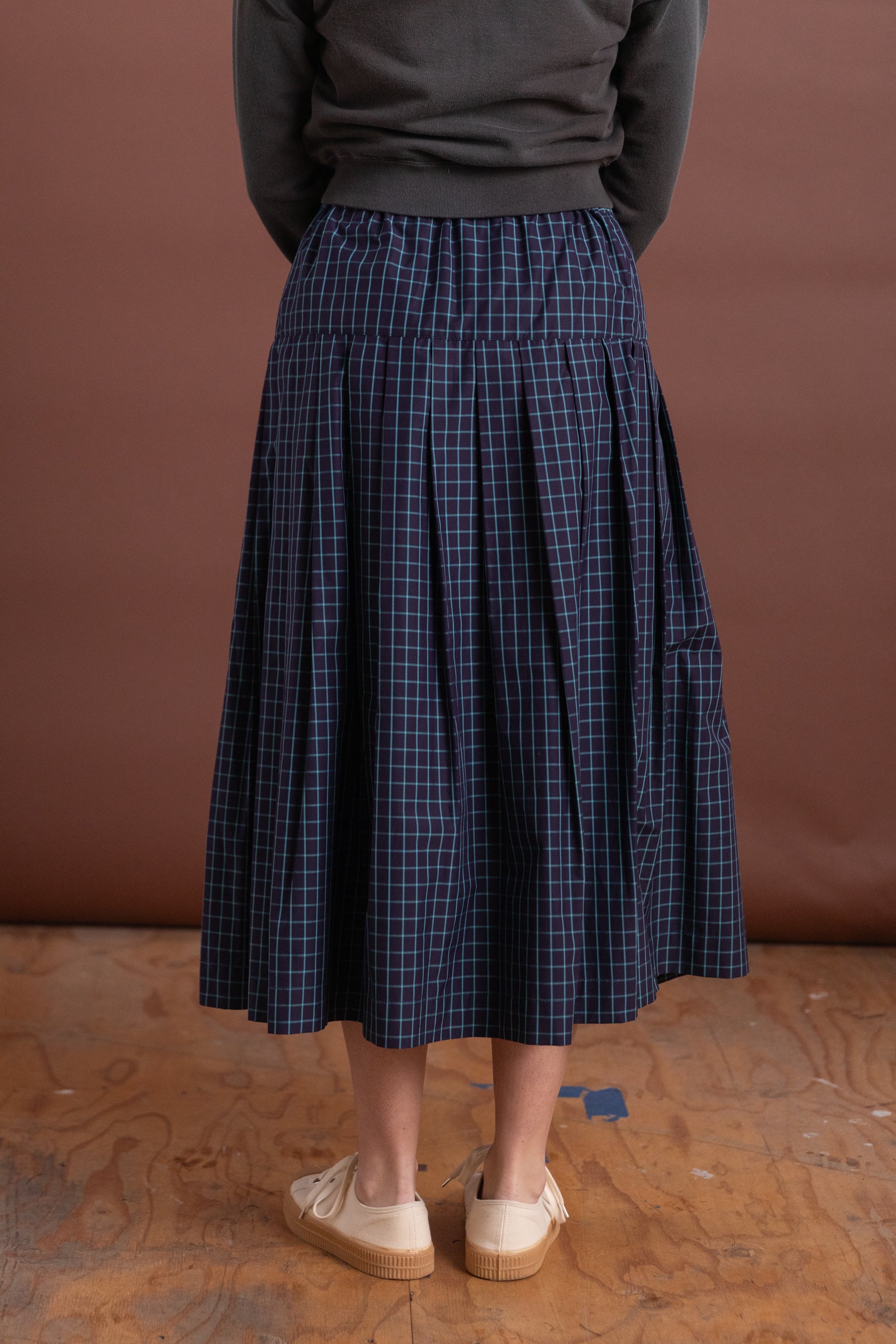 PLEATED SKIRT IN ITALIAN WINDOWPANE COTTON