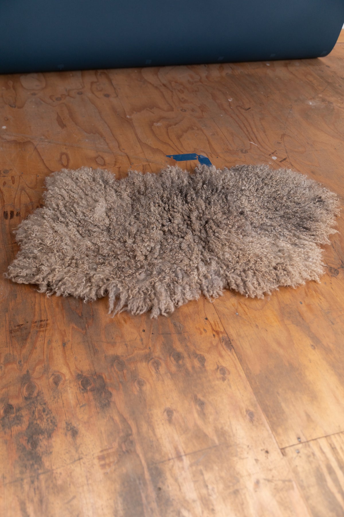 FELTED BENCH CUSHION IN NATURAL UNDYED WOOL