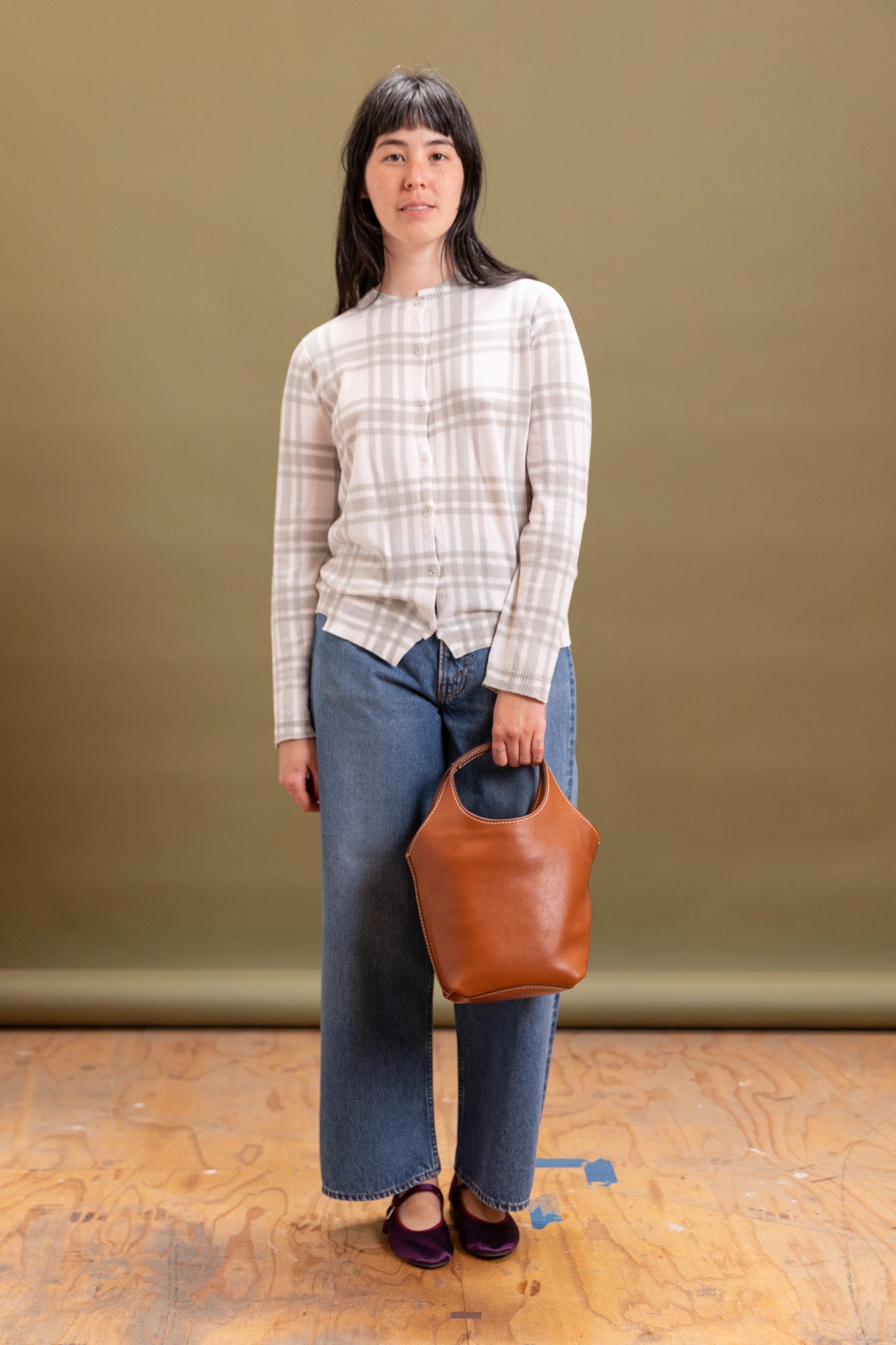 AMA IN BROWN LEATHER