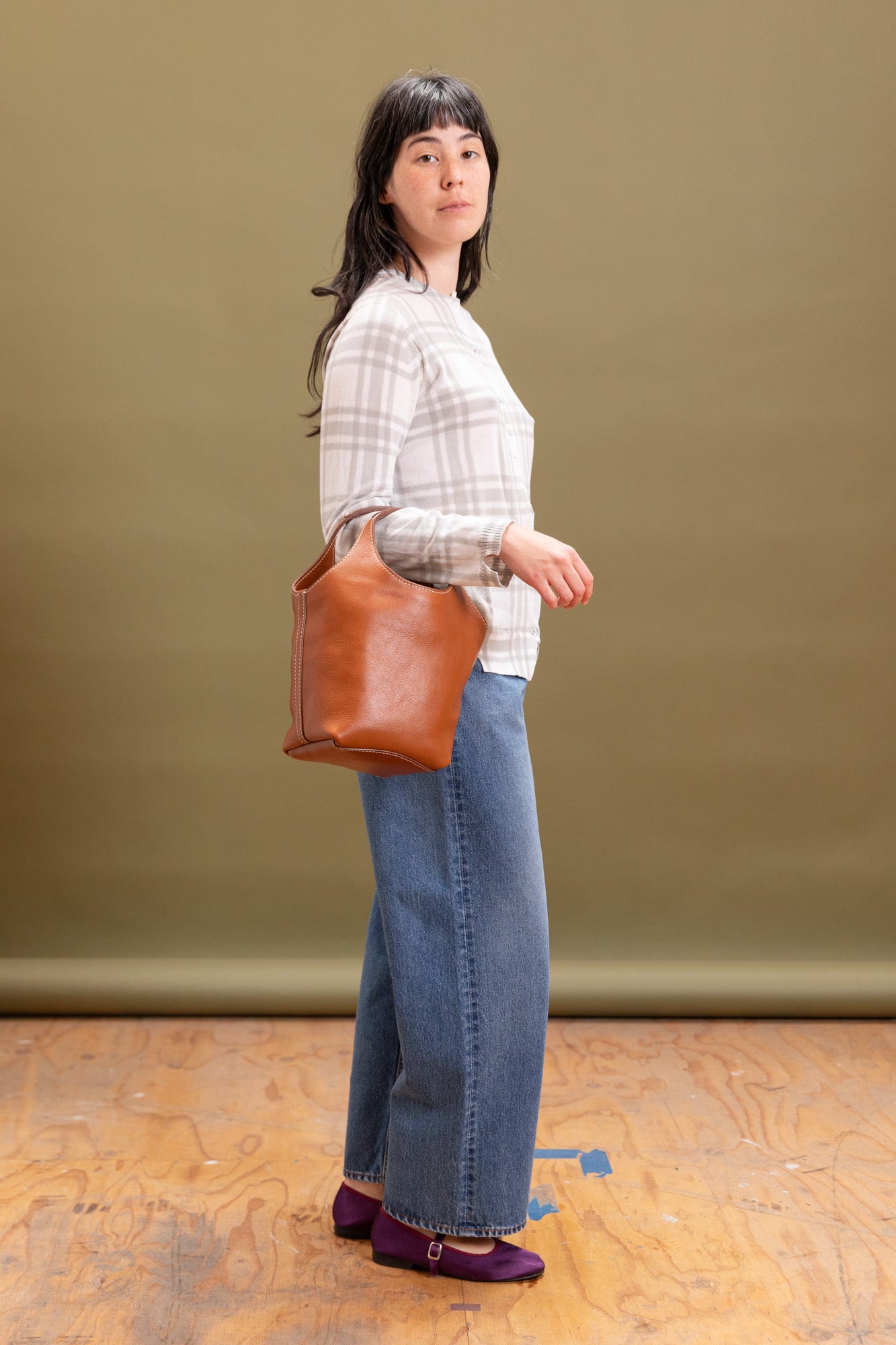 AMA IN BROWN LEATHER