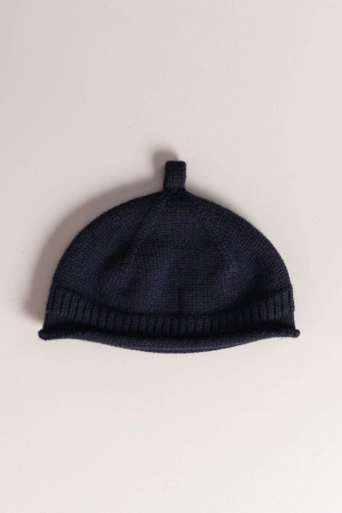 MHL ROLLED HEM BEANIE IN DARK NAVY BRITISH MERINO