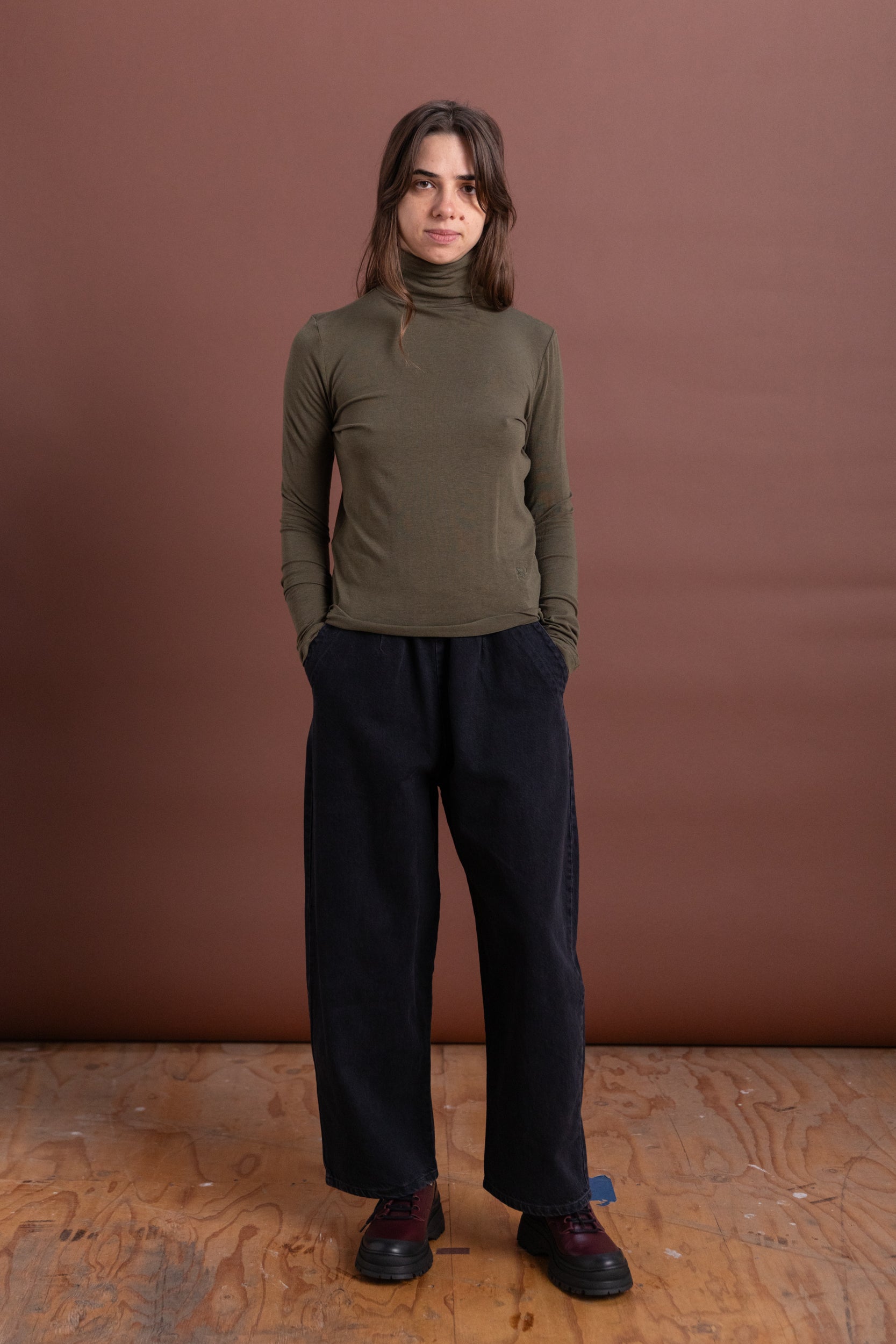 ROLL NECK JERSEY TOP IN LIGHT OLIVE