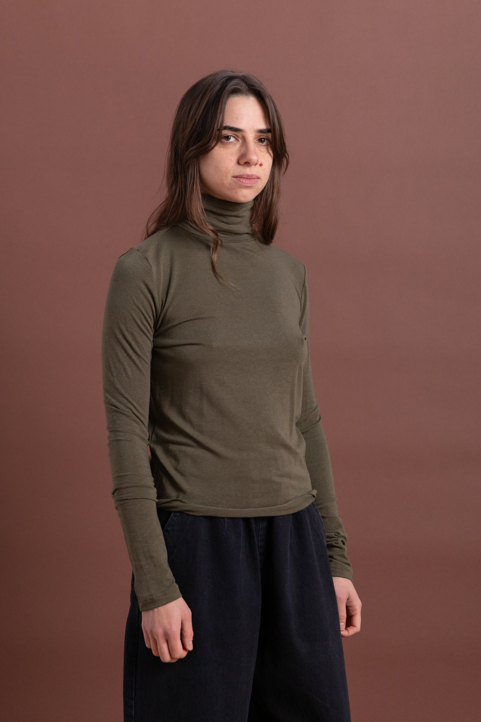 ROLL NECK JERSEY TOP IN LIGHT OLIVE
