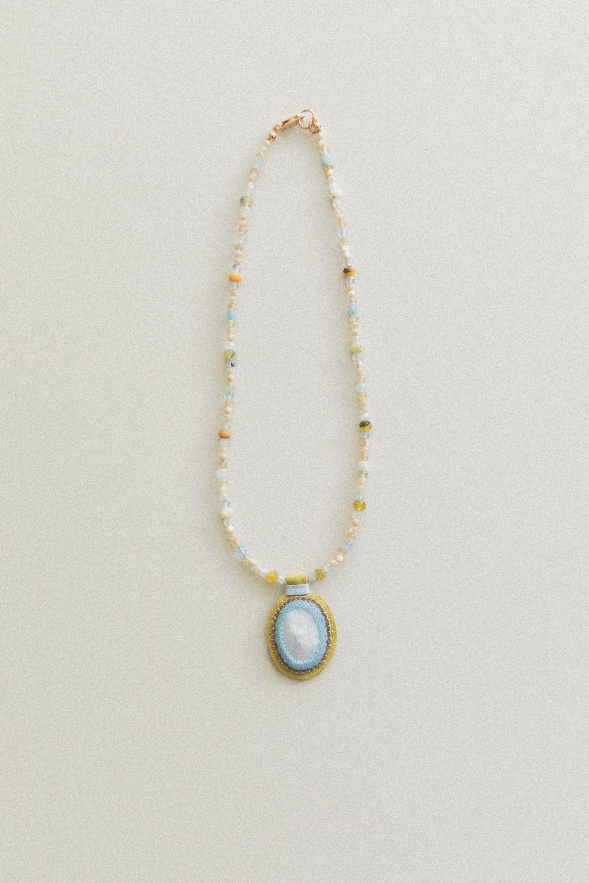 LOVE BEAD CHARM NECKLACE WITH A MOTHER-OF-PEARL CHARM
