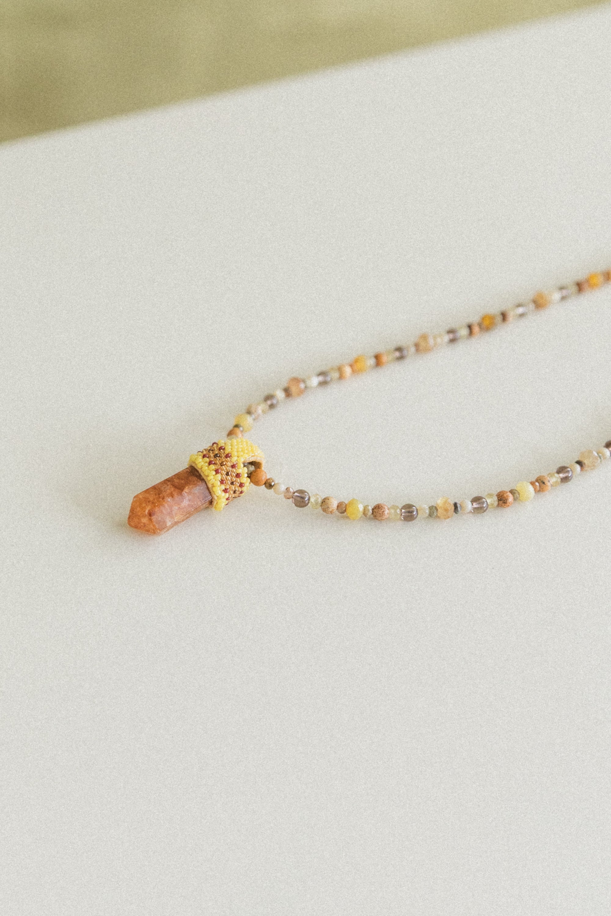 PEACE OF MIND NECKLACE WITH A CITRINE CRYSTAL PENDANT