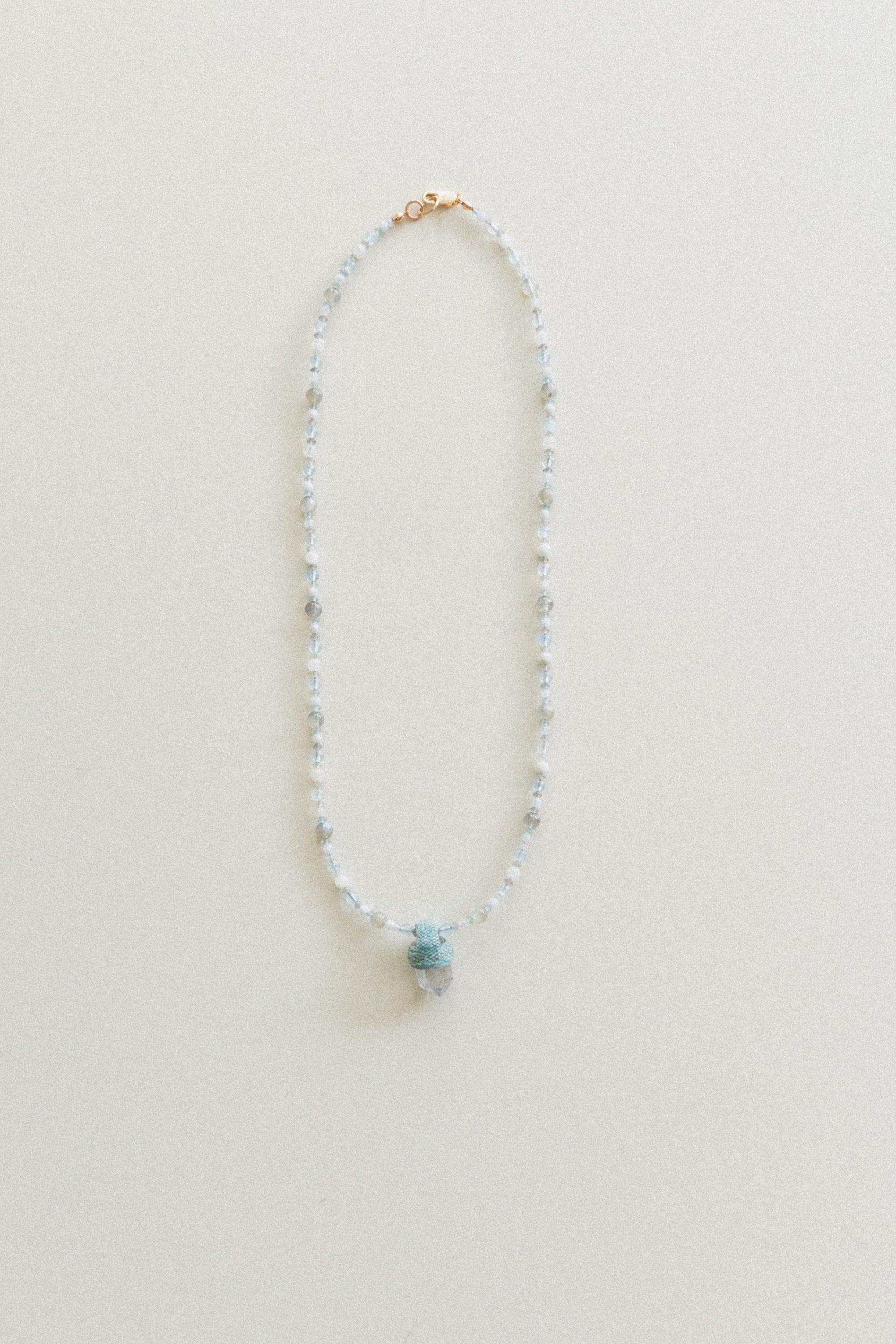PEACE OF MIND NECKLACE WITH A RUTILATED QUARTS CRYSTAL