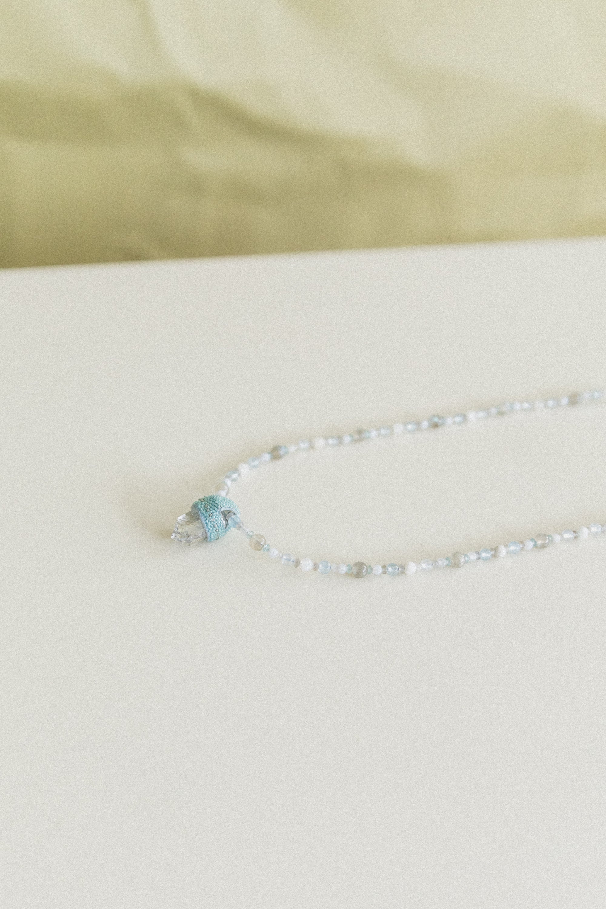 PEACE OF MIND NECKLACE WITH A RUTILATED QUARTS CRYSTAL