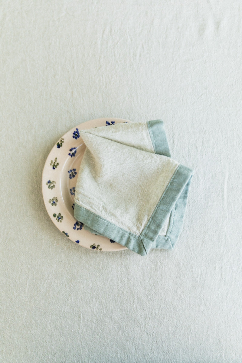 EDGED COCKTAIL NAPKINS IN MOSS LINEN - SET OF TWO