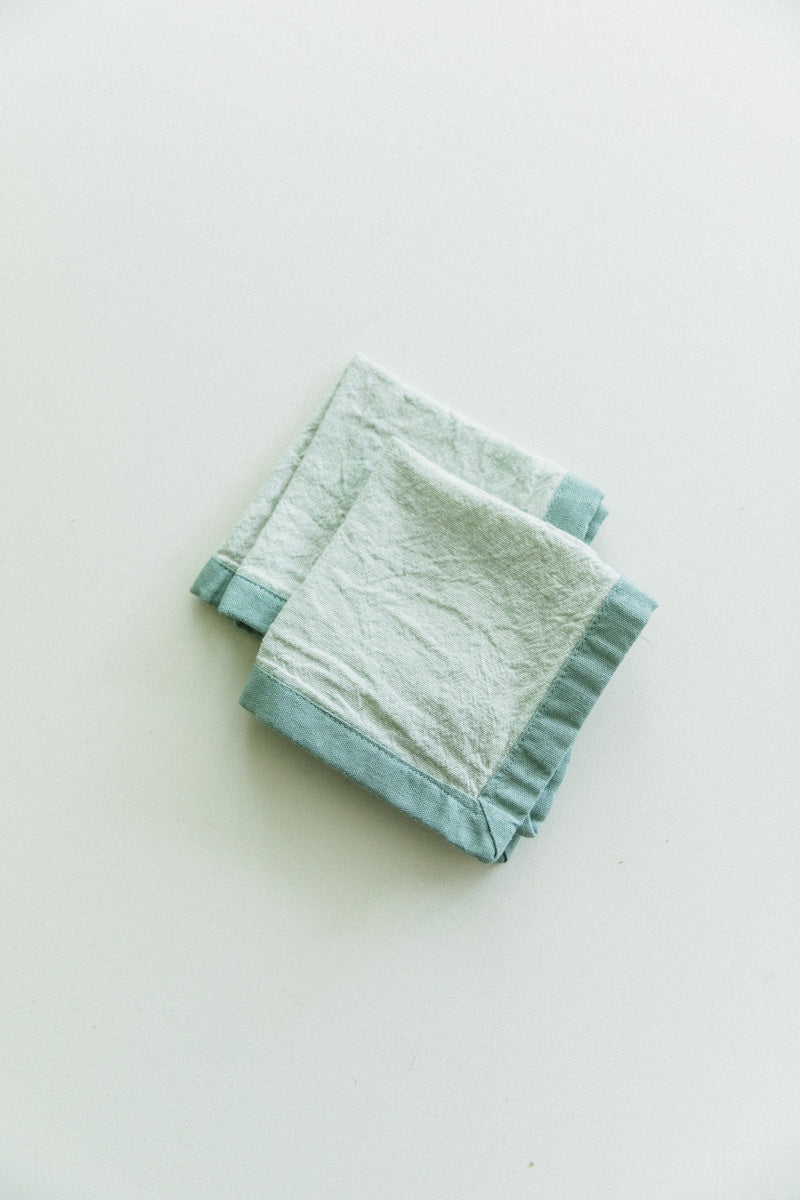 EDGED COCKTAIL NAPKINS IN MOSS LINEN - SET OF TWO