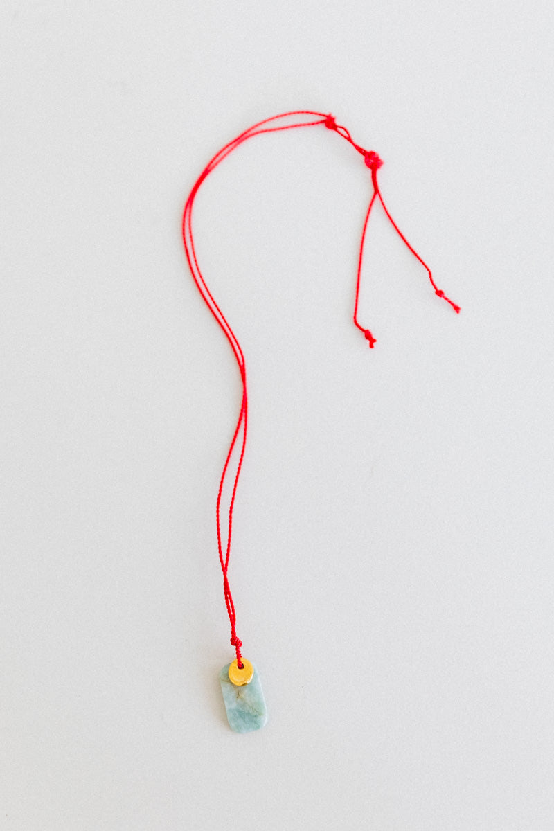 SOL NECKLACE ON A SILK CORD