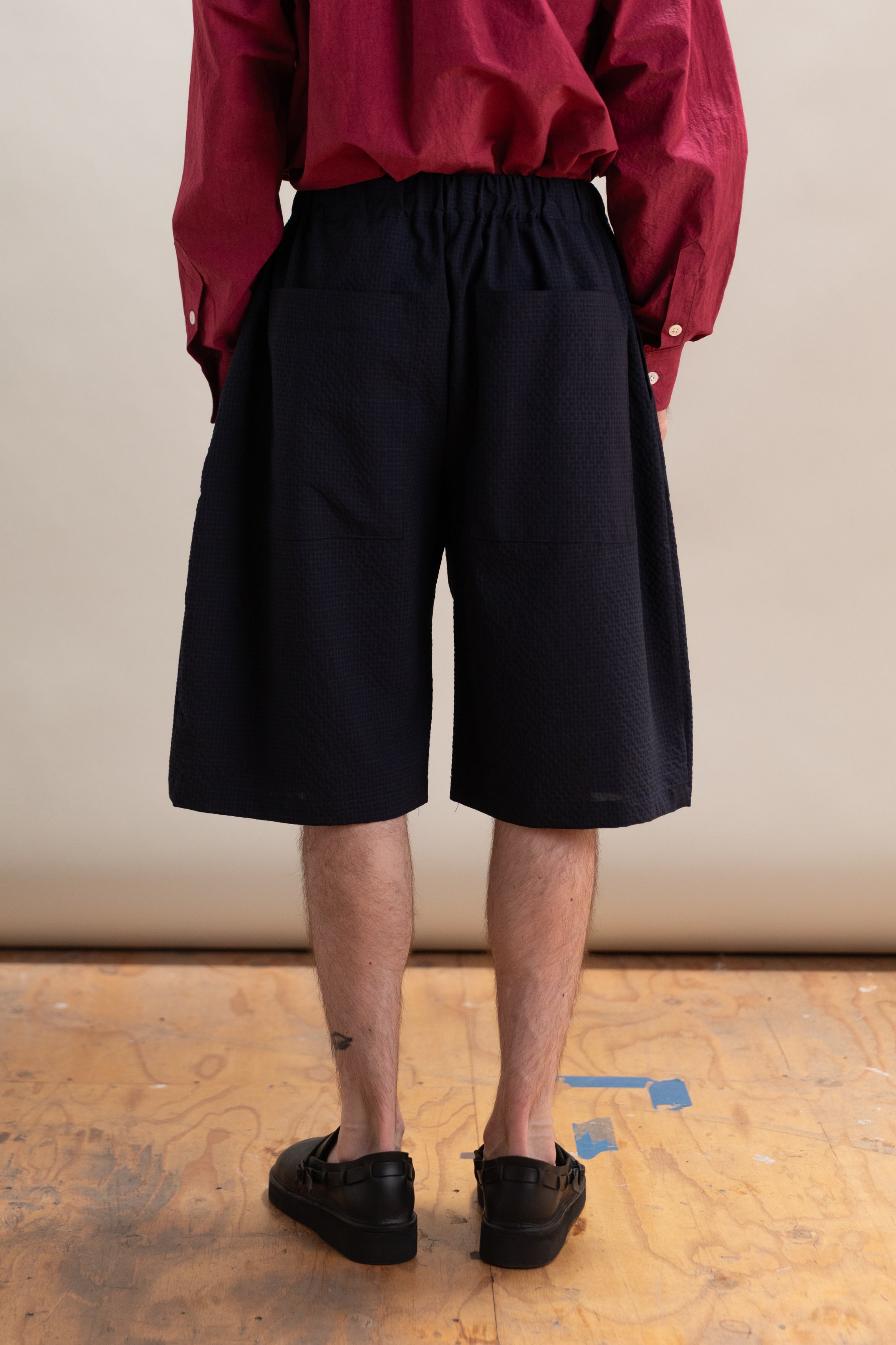 SUMMER LEAGUE SHORT IN NAVY SEERSUCKER