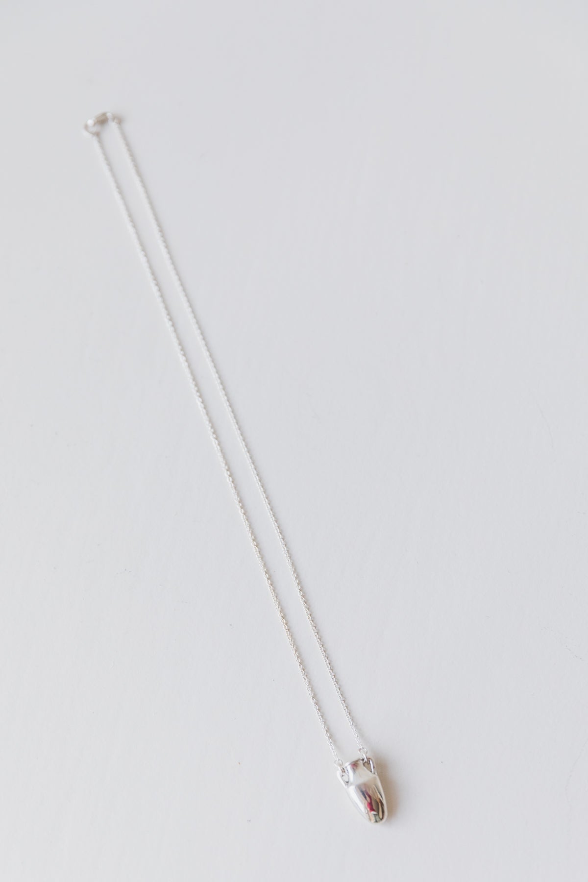 VASE NECKLACE IN SILVER
