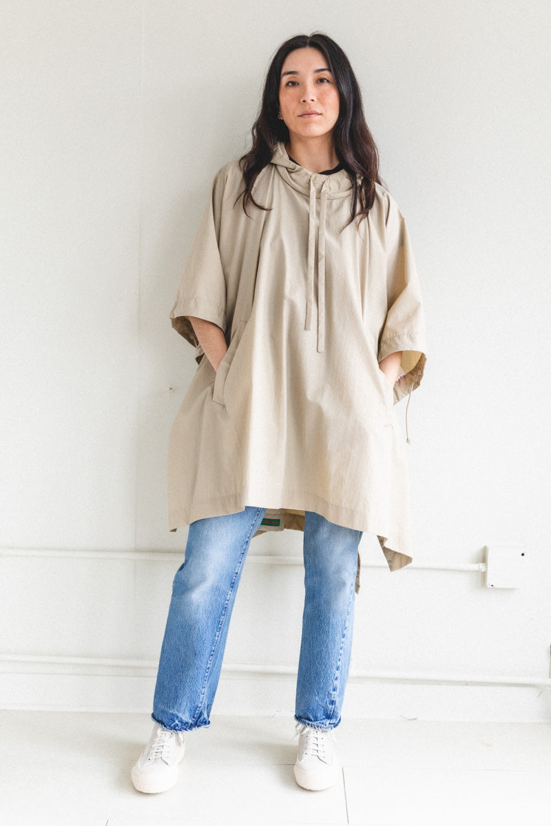 SHORT PONCHO IN BEIGE LIGHT TECH